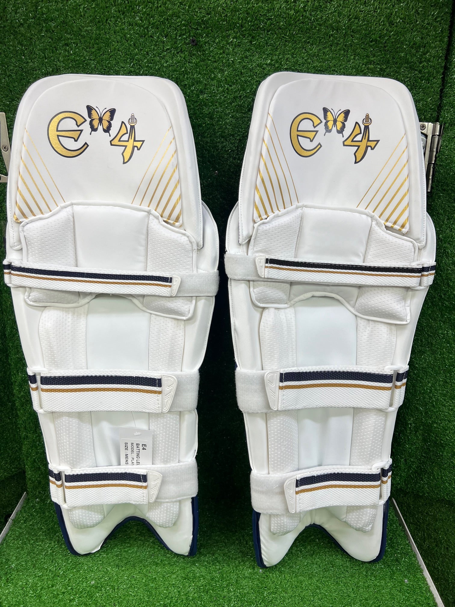 E4 Player's Edition Navy Blue and Gold Batting Leg Guard - 2024