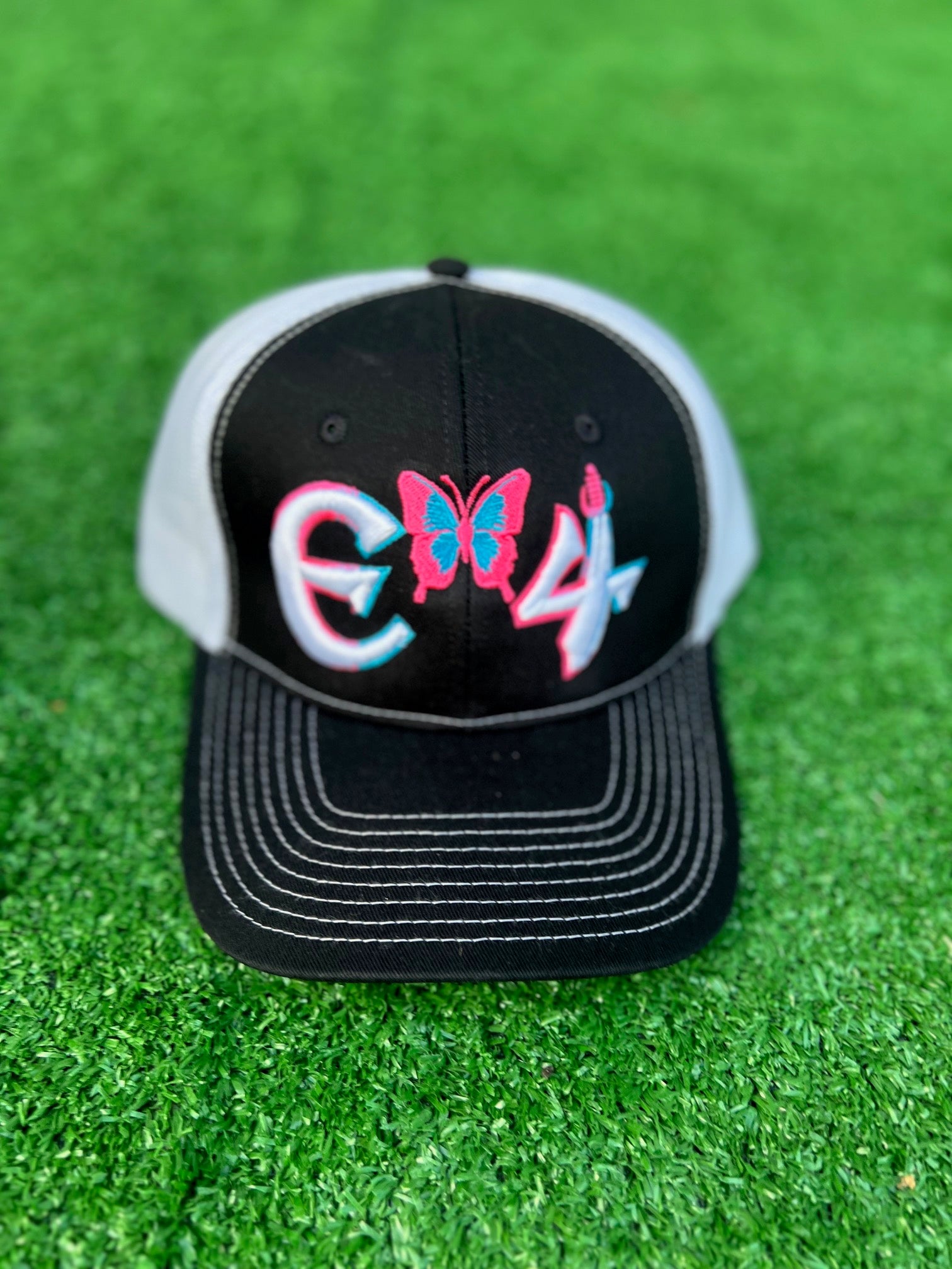 2025 E4 Trucker Hat - Black, Sky Blue, & Pink