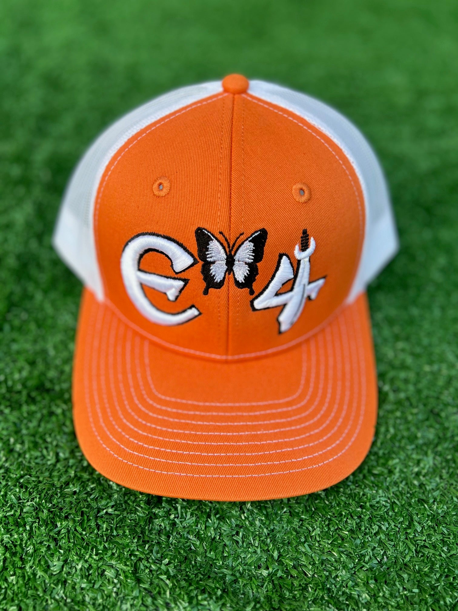 2025 E4 Trucker Hat - Texas Orange & White