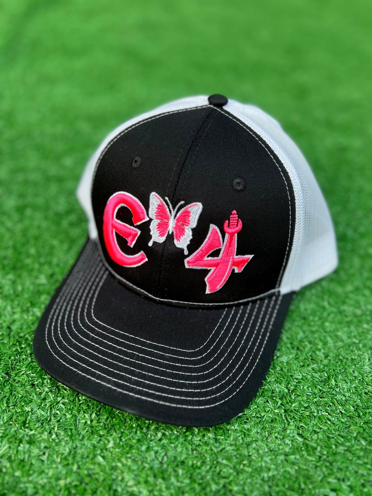 2025 E4 Trucker Hat - Black, Pink, & White