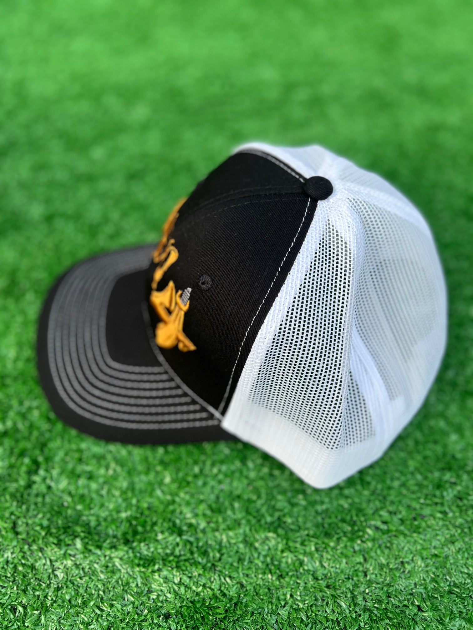 2025 E4 Trucker Hat - Black & Gold